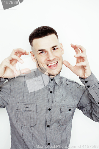 Image of young handsome well-groomed guy posing emotional on white background, lifestyle people concept