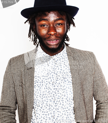 Image of young handsome afro american boy in stylish hipster hat gesturin