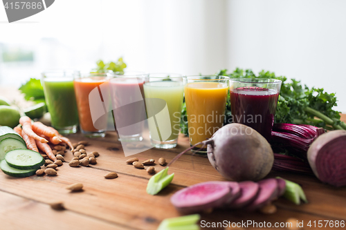 Image of glasses with different fruit or vegetable juices