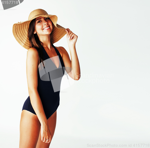 Image of young pretty brunette woman wearing summer hat and swimsuit isol