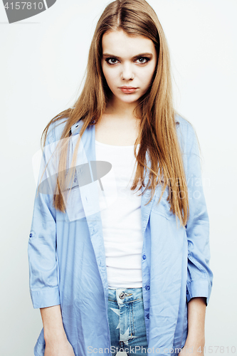 Image of young pretty stylish hipster teen blond girl posing emotional isolated on white background happy smiling cool smile, lifestyle people concept