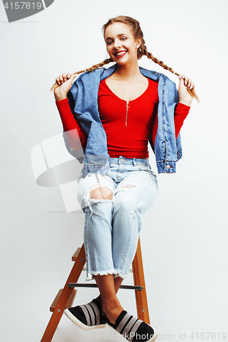 Image of young pretty stylish blond hipster girl posing emotional isolated on white background happy smiling cool smile, lifestyle people concept