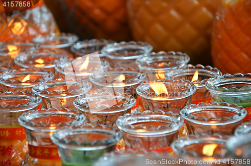 Image of Lighting a lamp for peace in Kek Lok Si temple, Penang