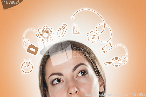 Image of Business woman thinking many ideas.