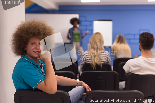 Image of Portrait of young informal businessman