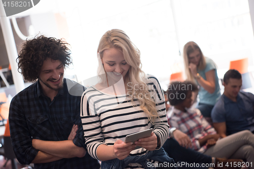 Image of Multiethnic startup business team on meeting two in front of the