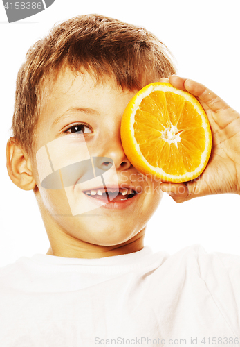 Image of little cute boy with orange fruit double isolated on white smili