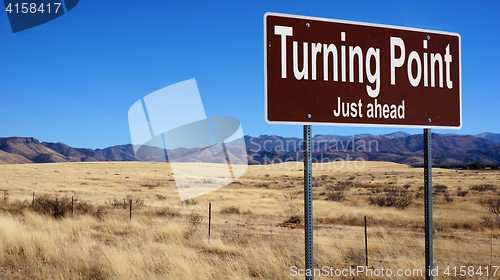 Image of Turning Point Just Ahead brown road sign