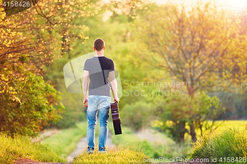 Image of Guy with guitar