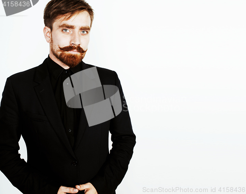 Image of young red hair man with beard and mustache in black suit on whit