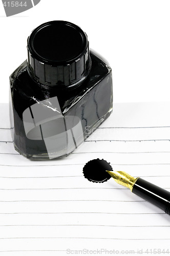 Image of fountain pen and notebook