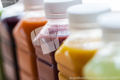 Image of bottles with different fruit or vegetable juices