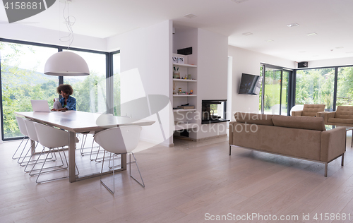 Image of African American woman in the living room