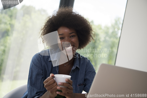 Image of African American woman in the living room