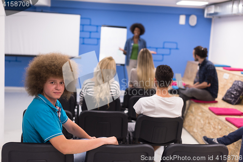 Image of Portrait of young informal businessman