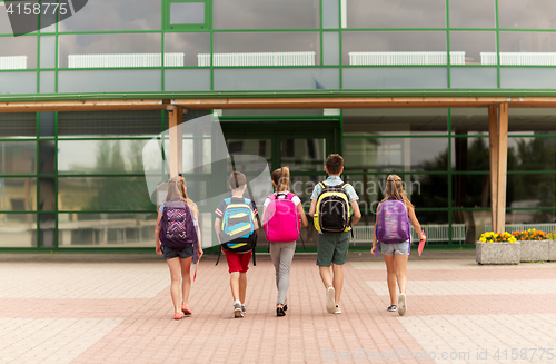 Image of group of happy elementary school students walking