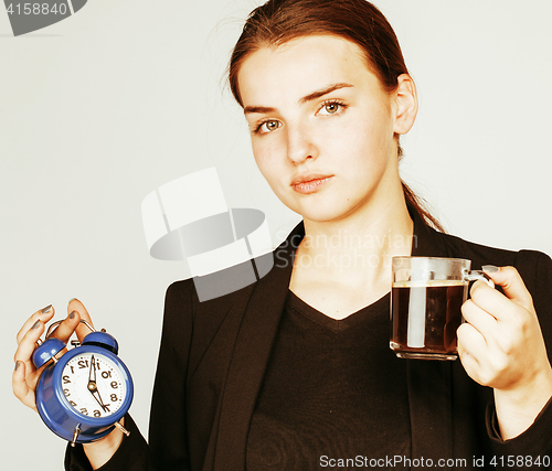 Image of young beauty woman in business style costume waking up for work 