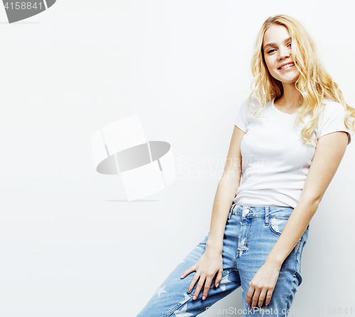 Image of young pretty blond teenage girl emotional posing, happy smiling isolated on white background, lifestyle people concept 