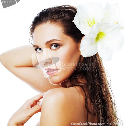 Image of young pretty woman with  Amarilis flower close up isolated on wh