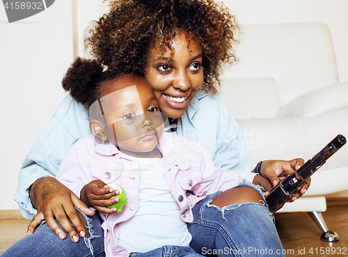 Image of adorable sweet young afro-american mother with cute little daugh