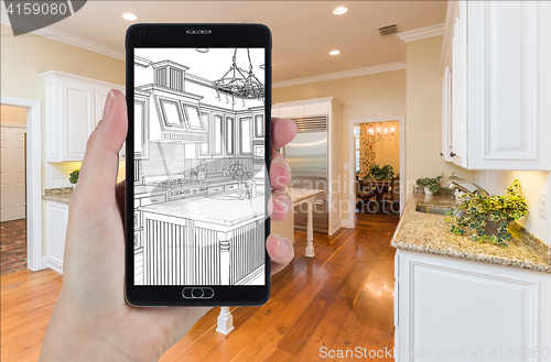 Image of Hand Holding Smart Phone Displaying Drawing of Kitchen Photo Beh