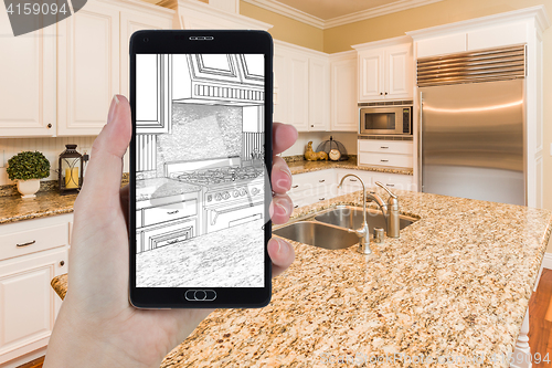 Image of Hand Holding Smart Phone Displaying Drawing of Kitchen Photo Beh