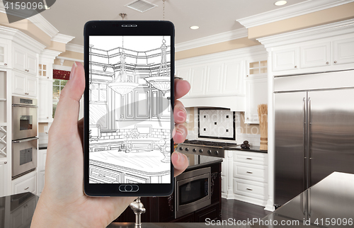 Image of Hand Holding Smart Phone Displaying Drawing of Kitchen Photo Beh