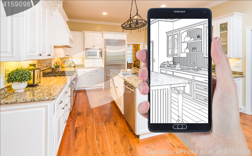 Image of Hand Holding Smart Phone Displaying Drawing of Kitchen Photo Beh