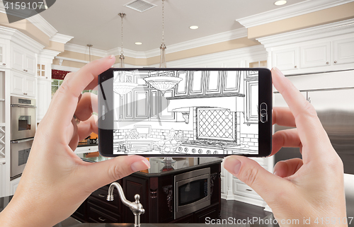 Image of Hands Holding Smart Phone Displaying Drawing of Kitchen Photo Be