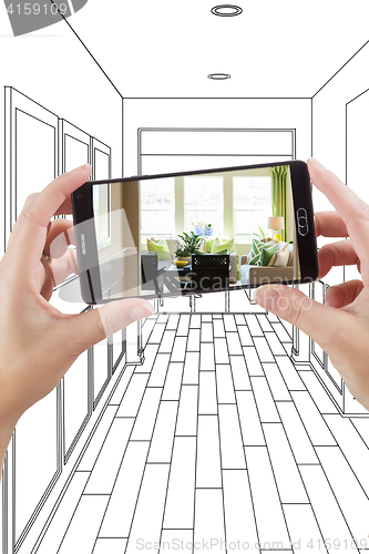 Image of Hands Holding Smart Phone Displaying Photo of House Hallway Draw