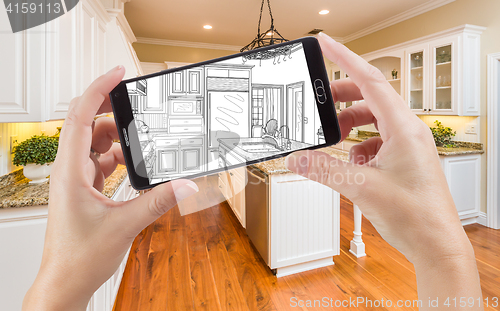 Image of Hands Holding Smart Phone Displaying Drawing of Kitchen Photo Be