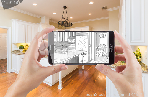 Image of Hands Holding Smart Phone Displaying Drawing of Kitchen Photo Be