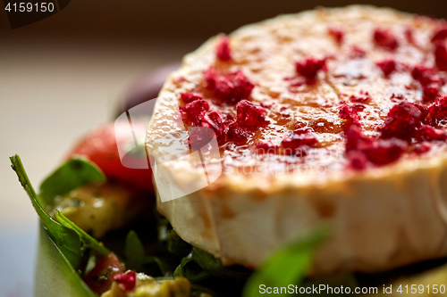 Image of close up of goat cheese salad with vegetables