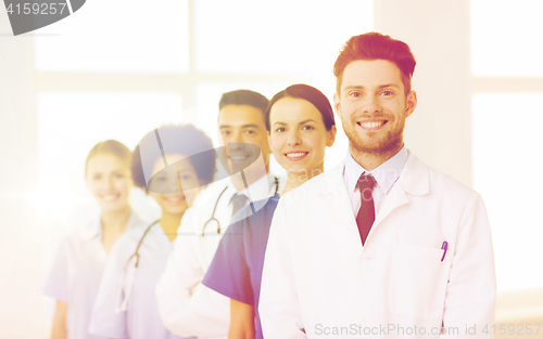 Image of group of happy doctors at hospital