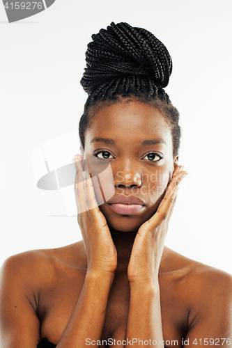 Image of young pretty african american woman naked taking care of her skin isolated on white background, healthcare people concept 