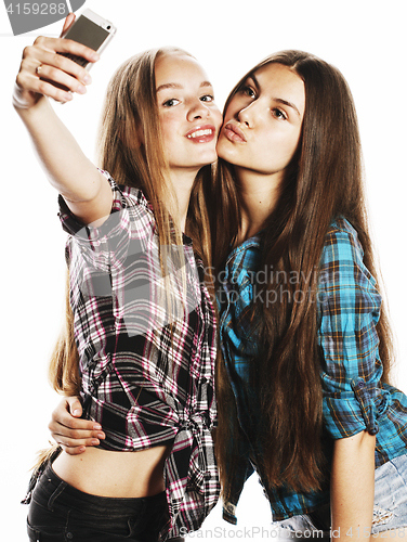 Image of cute teenage girls making selfie isolated