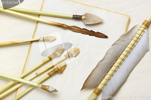 Image of Primitive hunting and fishing arrows with flint stone, wood and 