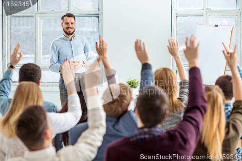 Image of Speaker at Business Meeting in the conference hall.