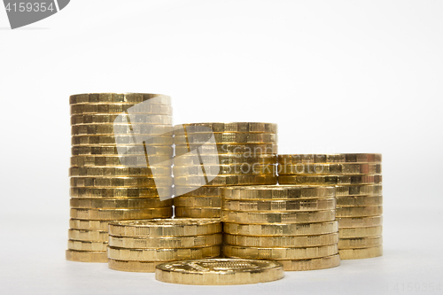 Image of Stacks of coins increasing in height uniformly