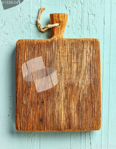 Image of Cutting board on wooden table