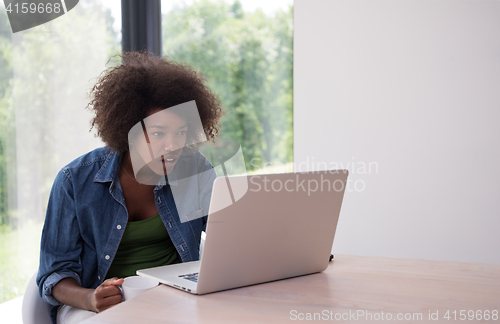 Image of African American woman in the living room