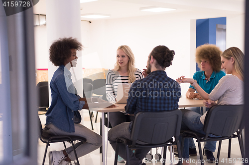 Image of Multiethnic startup business team on meeting