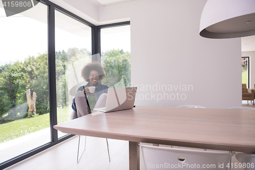 Image of African American woman in the living room