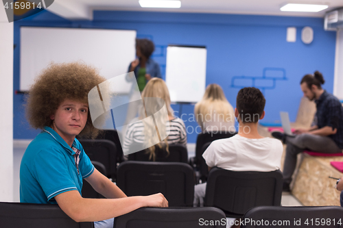 Image of Portrait of young informal businessman