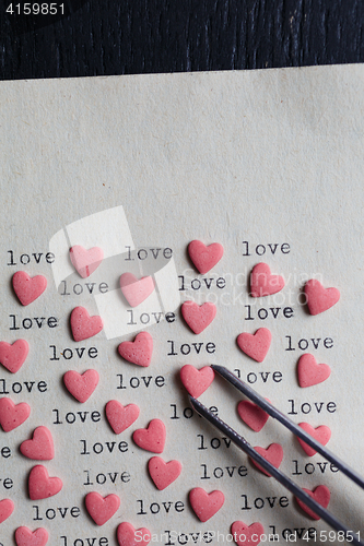 Image of Heart shaped candy with loving words