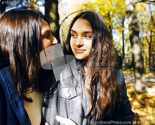 Image of mature mother with daughter outside