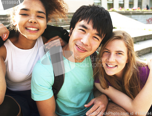 Image of portrait of international group of students close up smiling, bl