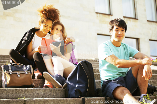 Image of portrait of international group of students close up smiling, bl