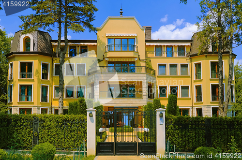 Image of Four-storey House in Park