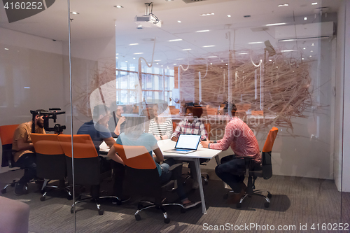 Image of Multiethnic startup business team on meeting